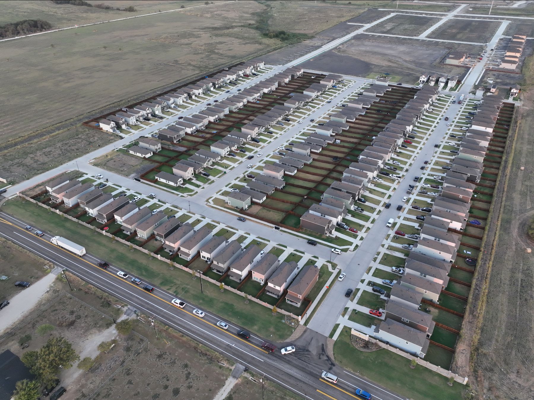 Aerial view of the built-out Phase 1 neighborhood at Cartwright Mays along FM 148 in Crandall, Texas, with newer streets beyond