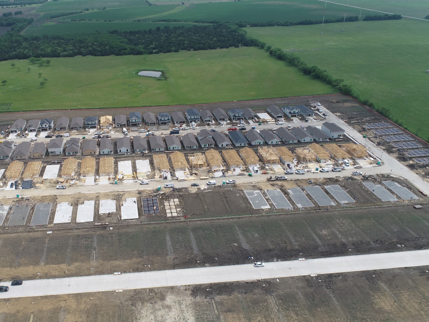 Aerial view of completed homes and finished lots at Magnolia in Josephine, Texas