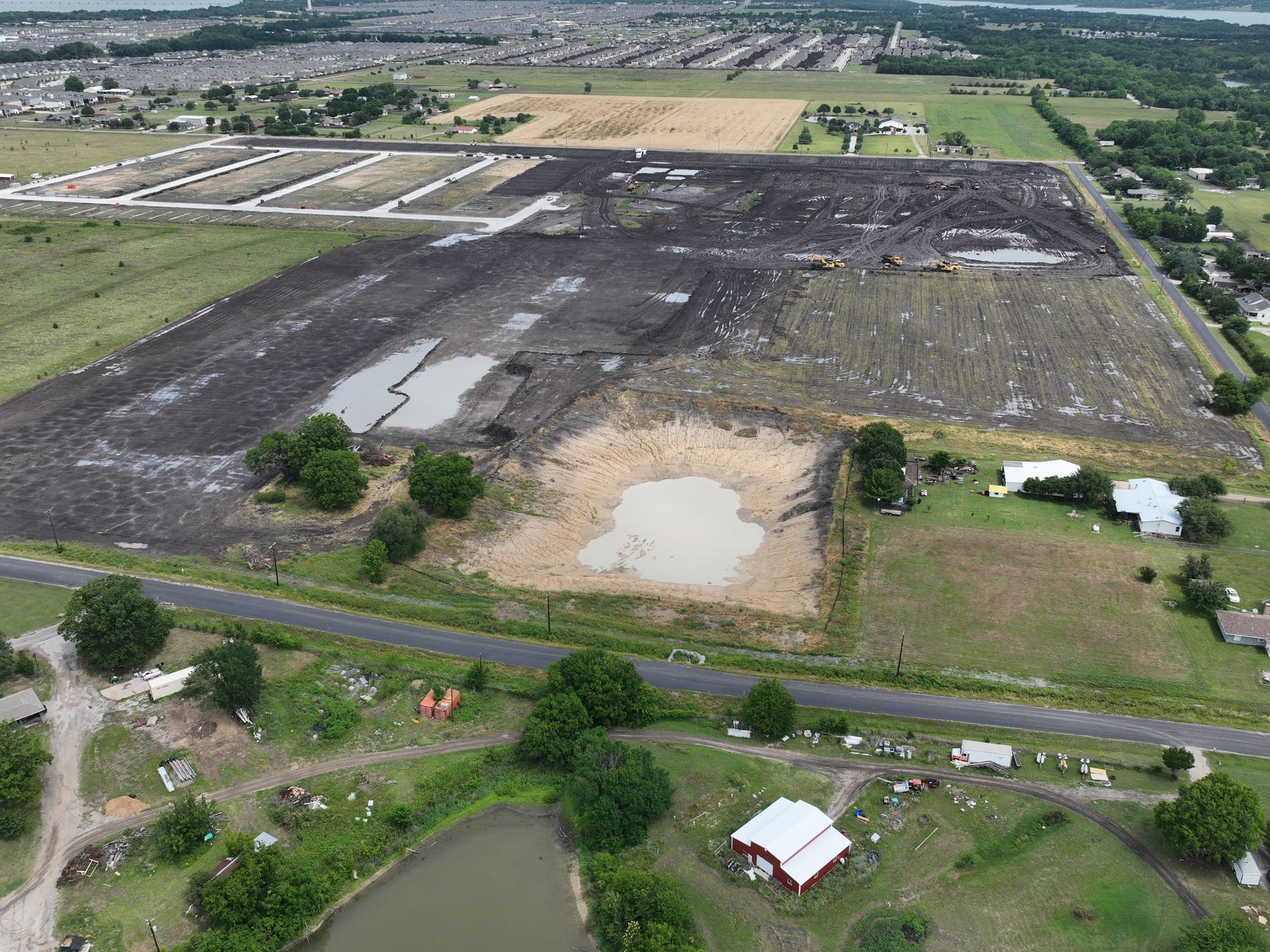 Aerial view of earthwork and detention ponds at Arbor Lakes Phase 1B near Princeton, Texas
