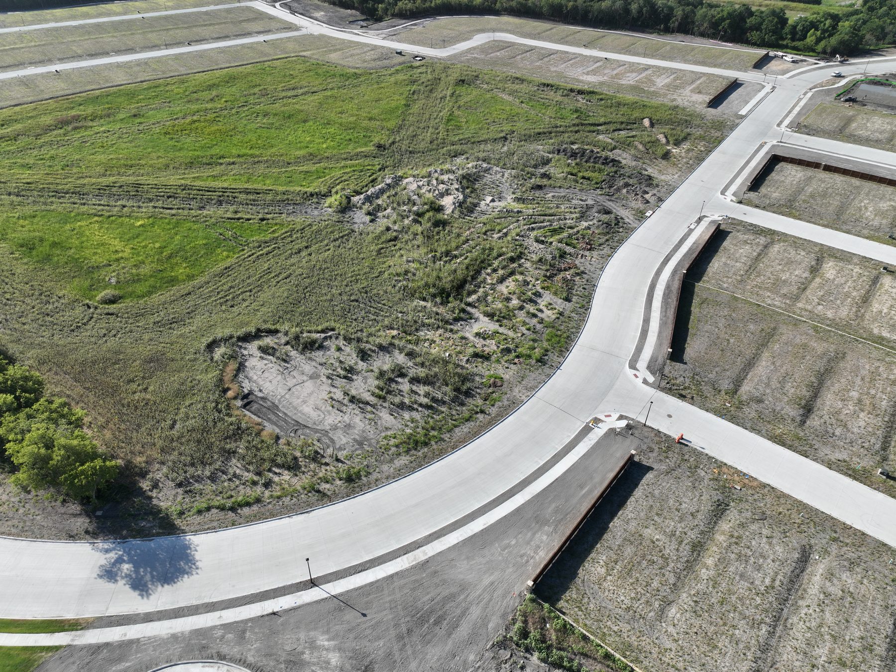 Aerial view of finished streets and delivered homesites at Elevon Section 1, Phase 4 in Lavon, Texas